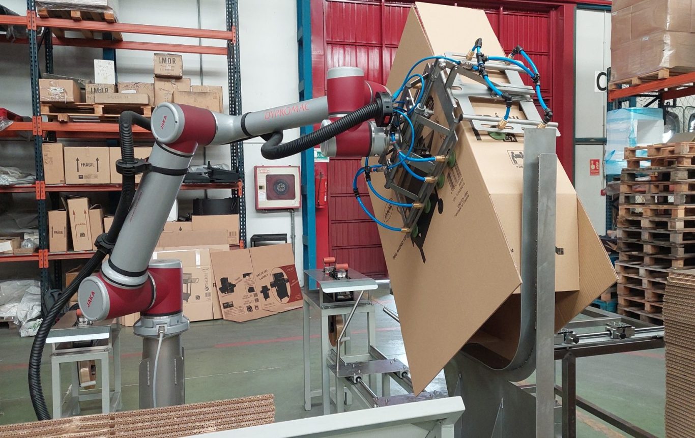robot conformador de cajas en funcionamiento
